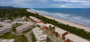 Apto em condomínio na praia, com terraço, em Ilhéus-BA
